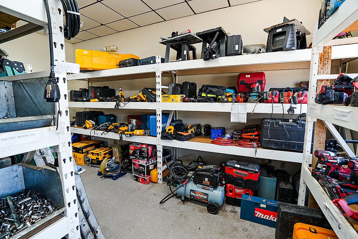 Tool aisle stocked with DeWalt and Milwaukee power tools